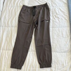 Atheltic wear plum colored joggers with Elastic Cuffs